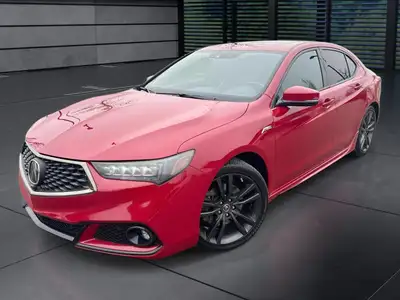 Experience the thrill of driving with the stunning red 2018 Acura TLX Elite A-Spec Sedan, powered by...