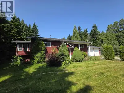 Lakelse Lake acreage living!!! Spacious 5 bedroom 3 bathroom home situated on 2.4 acres just 1 block...