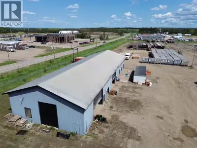 Shop for lease with with 4.80 acres graveled and fenced with great visibility for your business alon...