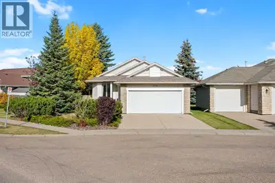 Enjoy easy living and peaceful green space views in College Park! This beautiful detached bungalow o...
