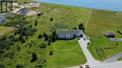 Visit REALTOR® website for additional information. Sitting on nearly five acres of breathtaking wate...