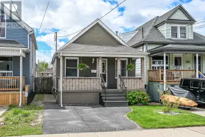 In a quiet neighborhood just steps from trendy Ottawa Street sits this spacious bungalow offering ea...
