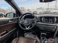 This *2018 Kia Sportage EX* is powered by a 2.4L I4 engine paired with a smooth 6-speed automatic tr... (image 9)