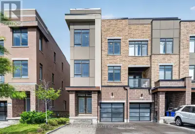 Rarely offered luxurious showstopper end-unit townhouse that feels like a semi, with no monthly fees...