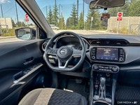 This 2022 Nissan Kicks SV, boasting a sleek Super Black exterior and a stylish charcoal interior, is... (image 8)