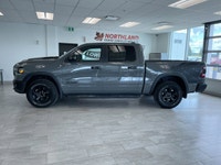 The 2023 Ram 1500 Rebel with the 5.7L HEMI V8 eTorque engine is the perfect blend of off-road capabi... (image 1)