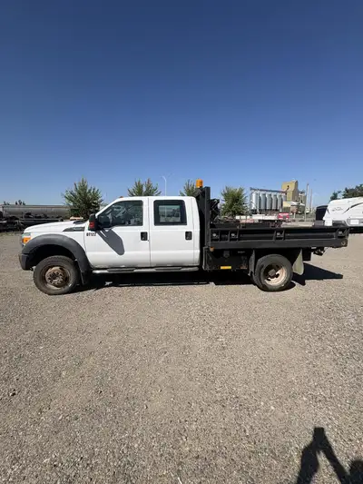 2012 Ford F-550 XL 4x4 Crew Cab Dump $34,800 + GST Low Kilometres • Heavy Duty • Ready to Work Hard...