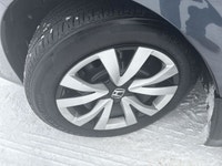 The 2024 Honda Civic Sedan LX-B CVT in sophisticated gray combines front-wheel drive with precise ha... (image 9)