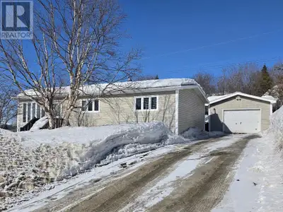 NEW LISTING!! Beautiful bungalow nestled on a quiet street with 3 bedrooms + 2 bonus rooms in the ba...