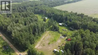 This secluded 6.4 acres property is 25 minutes from Grimshaw and Peace River.There is a old home on...