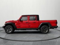 Experience the power and style of the 2023 Jeep Gladiator Rubicon, dressed in an attention-grabbing... (image 1)