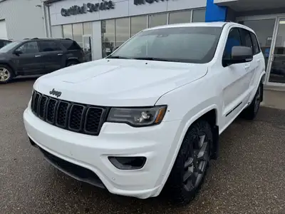 Our exclusive 2021 Jeep Grand Cherokee Limited 4X4 wraps assertive capability in a dramatic Bright W...