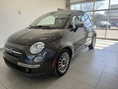 **BANCS CHAUFFANTS / AIR CLIMATISE / CRUISE CONTROL** La Fiat 500 Lounge 2015 est une voiture compac...