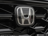 The 2025 Black Honda CR-V Hybrid Touring AWD is your gateway to balanced power and superior handling... (image 7)