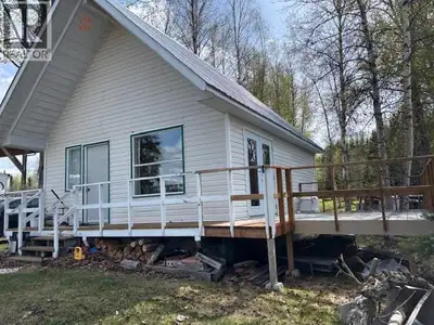Escape to 28360 Joellen Road on beautiful Ness Lake, just outside Prince George. This 1.06-acre lake...