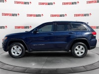 This outstanding example of a 2015 Jeep Grand Cherokee Laredo is offered by Stampede Auto. The Jeep... (image 1)
