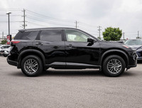 The 2023 Nissan Rogue AWD S in a sleek black hue complements its AWD capabilities, delivering a smoo... (image 2)
