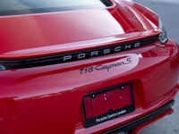 Look At The Option List On This Beautiful Guards Red 718 Cayman S. Available Now At Porsche Centre L... (image 9)