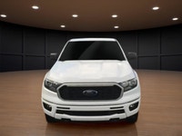 Experience the power of a 2019 Ford Ranger XLT in a crisp white finish, equipped with a robust 4x4 d... (image 2)