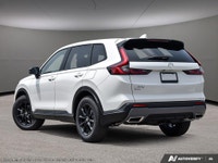 The 2026 Honda CR-V Hybrid EX-L AWD, dressed in a sophisticated white exterior and outfitted with a... (image 3)