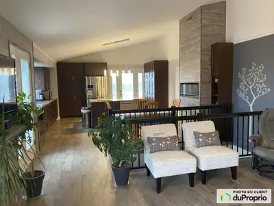 Résidence en pierre naturelle située à Rivière Brochu. Que vous soyez charmé par son aire ouverte de...