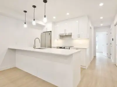first and last at the signature 141 Duranceau — Montréal - 5 appliances included in every unit - Cen...