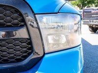 The 2021 Ram 1500 Classic Express 4x4 Crew Cab 57 Box is ready to tackle any road with its striking... (image 6)