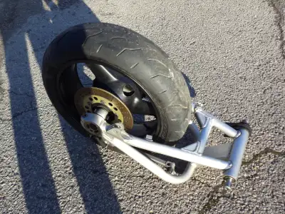 sonic cycle has a 1999 - 2004 kawasaki zrx - 1100 or 1200 rear swing arm comp with rear rim brakes r...