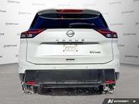 The 2024 Nissan Rogue SV Moonroof, in brilliant white, offers an elevated driving experience with on... (image 5)