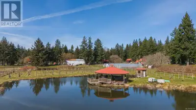 Discover Terra Nova Farms on Quadra Island, BC, spanning 106 acres with 2,400+ linear feet of high b...