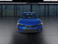 The 2024 Honda Civic Sedan Sport in stylish Blue is a front-wheel-drive masterpiece that promises im... (image 2)