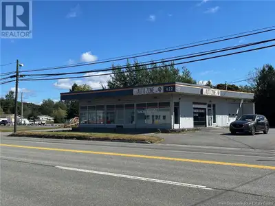 This prominent 2500 sq ft building, positioned on a spacious 5055 sq ft lot, occupies a prime commer...