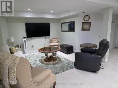 Beautiful, fully furnished and well-maintained one-bedroom walkout basement apartment featuring an o...