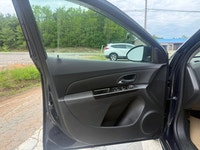 A practical compact sedan with a comfortable interior, efficient performance, and modern convenience... (image 6)