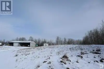 158 Acres Zoned (NSRV) North Saskatchewan River Valley. Fully Developed 30'x46' insulated shop power...