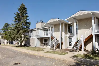 Welcome Home! Charming 2 Bed 1 Bath Carriage Style Upper Floor Townhouse For Rent in the beautiful c...