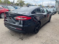 HERE IS A NICE CLEAN ACCIDENT FREE FORD SEDAN FOR YOU IT LOOKS AND DRIVES GREAT AND SOLD CERTIFIED C... (image 3)