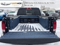 Experience the robust power and commanding presence of the 2012 Ram 3500 Laramie with its stunning d... (image 5)