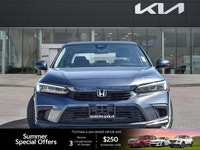 The 2022 Honda Civic Sedan EX, a striking grey 4-door car with a comfortable black interior, redefin... (image 1)