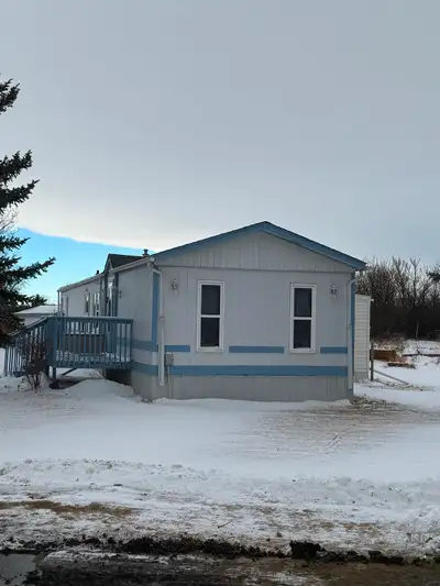 Must be moved 1991 triple e with large 12x60 addition has two additional beds and family room applia...