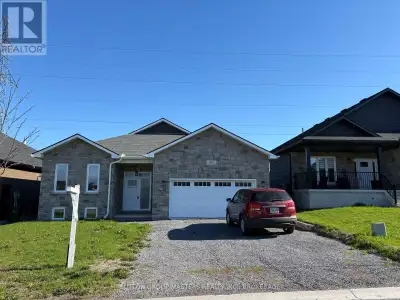This newer 1842 Sq. Ft. bungalow is move-in ready and is located in the beautiful community of Westb...
