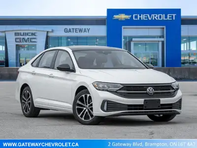 The 2024 Volkswagen Jetta Comfortline stands out in a refined White finish that complements its slee...