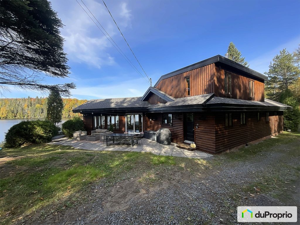 $595,000 - Cottage for sale in Ste-Rose-Du-Nord — photo 1