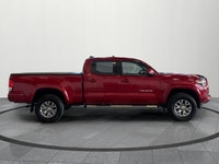 Check out this rugged and dependable 2016 Toyota Tacoma Double Cab! This accident free Ontario vehic... (image 6)
