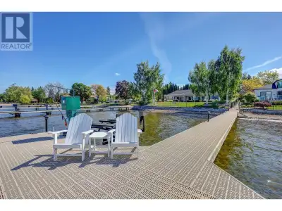 Rare offering on the shores of Okanagan Lake. This one-level lakeshore estate in Kelowna’s coveted L...