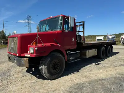 Year: 1999 Make: Volvo Model: Hook Lift KM: 14,124km Engine: M11 Plus Cummins Horsepower: 330hp Tran...