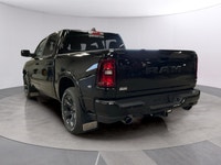 The 2026 Ram 1500 Big Horn 4x4 Crew Cab 57 Box comes in a striking Diamond Black Crystal Pearl finis... (image 2)