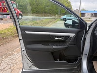 A practical compact SUV with a spacious interior, efficient performance, and modern safety features,... (image 6)