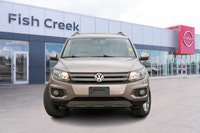 Navigate every road with confidence in this sophisticated 2015 Volkswagen Tiguan Comfortline. Engine... (image 1)