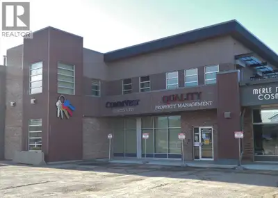 FOR LEASE - Easy Access, Two-Story, Single Tenant Professional Office Building w/Four Car Garage and...